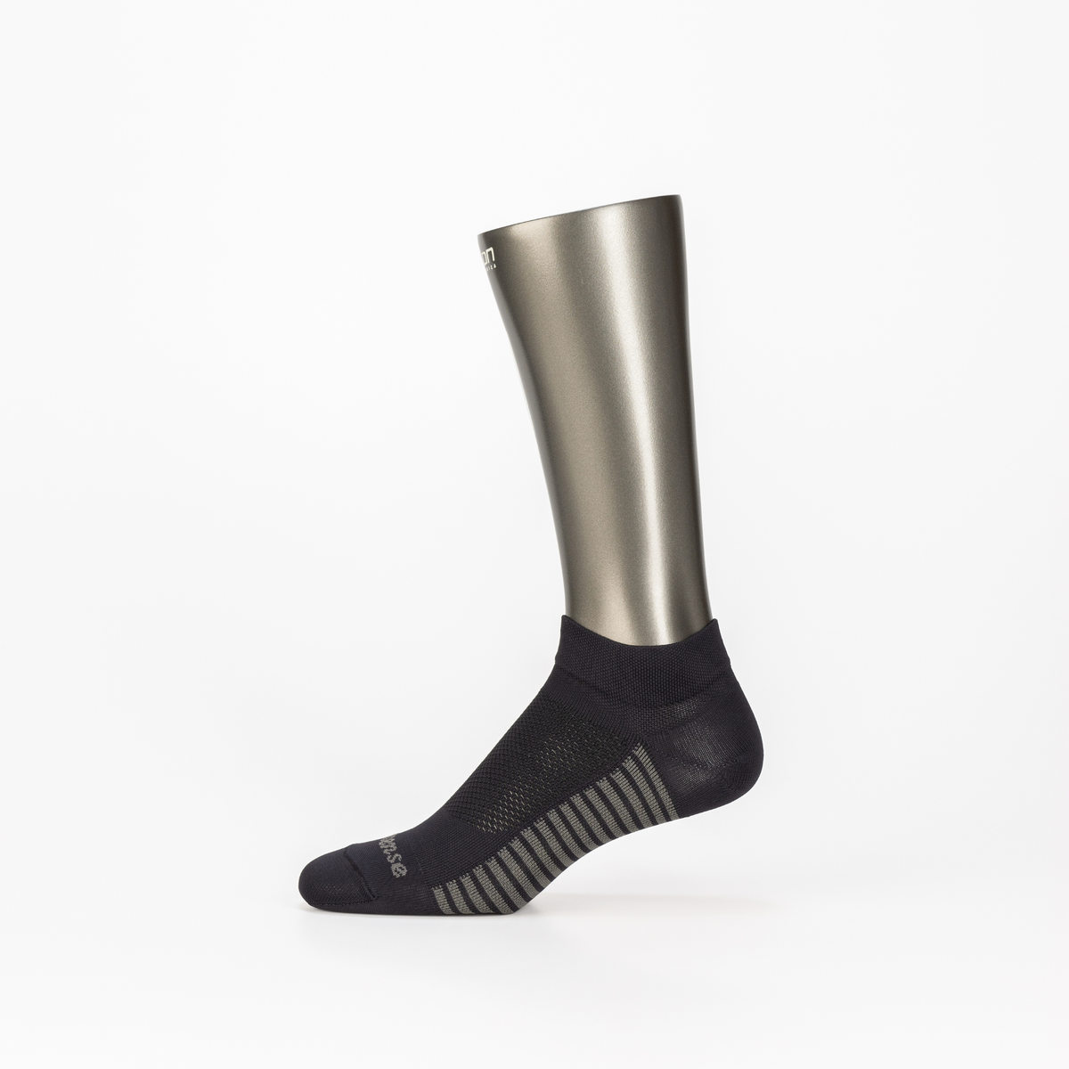 Athletic Ankle Compression Socks in Black – on a mannequin foot, product photo