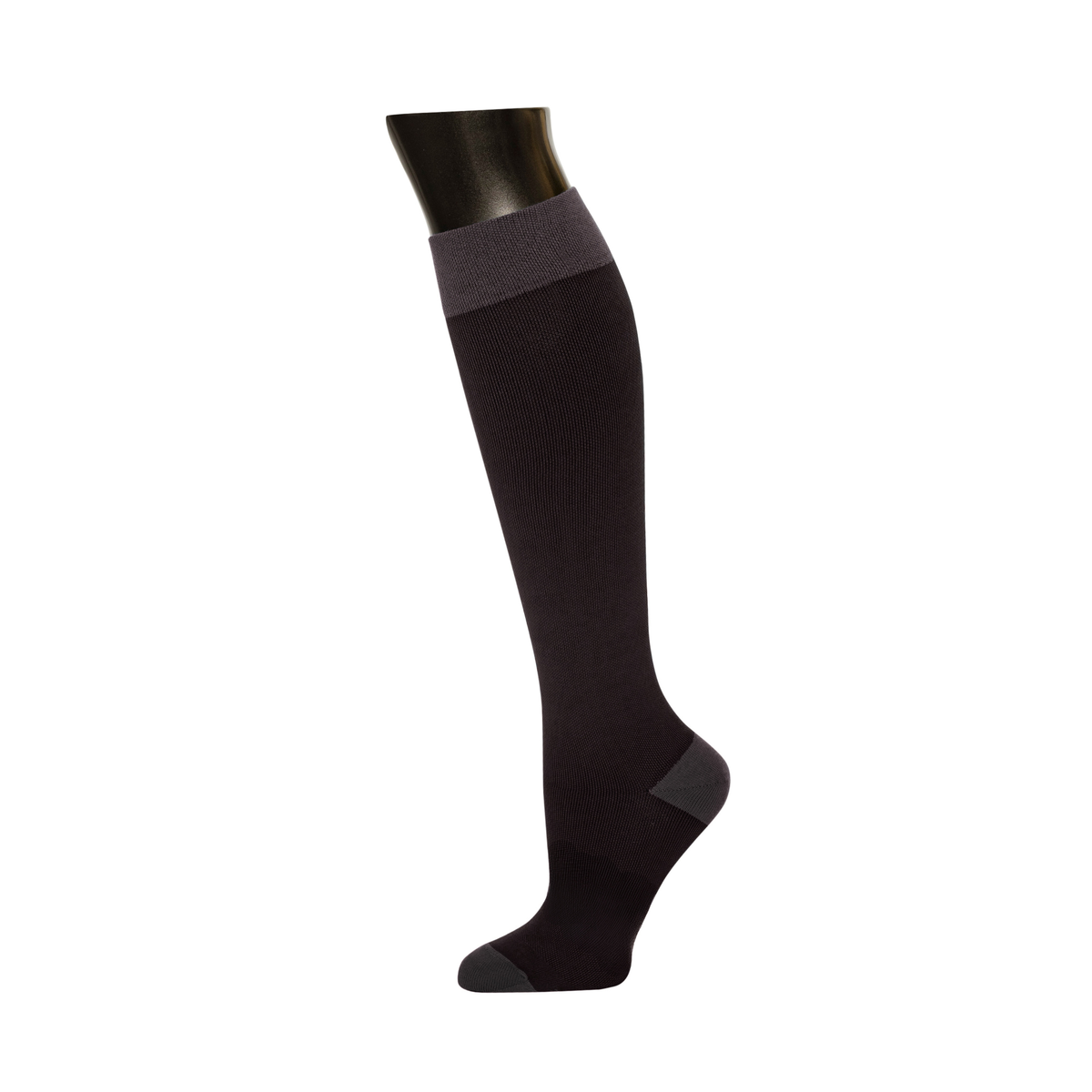 Knee-High Compression Socks in Black – on a mannequin leg, product photo